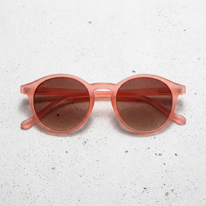 Frame: Transparent Peach / Light Coral Lens: Brown / Warm Tint