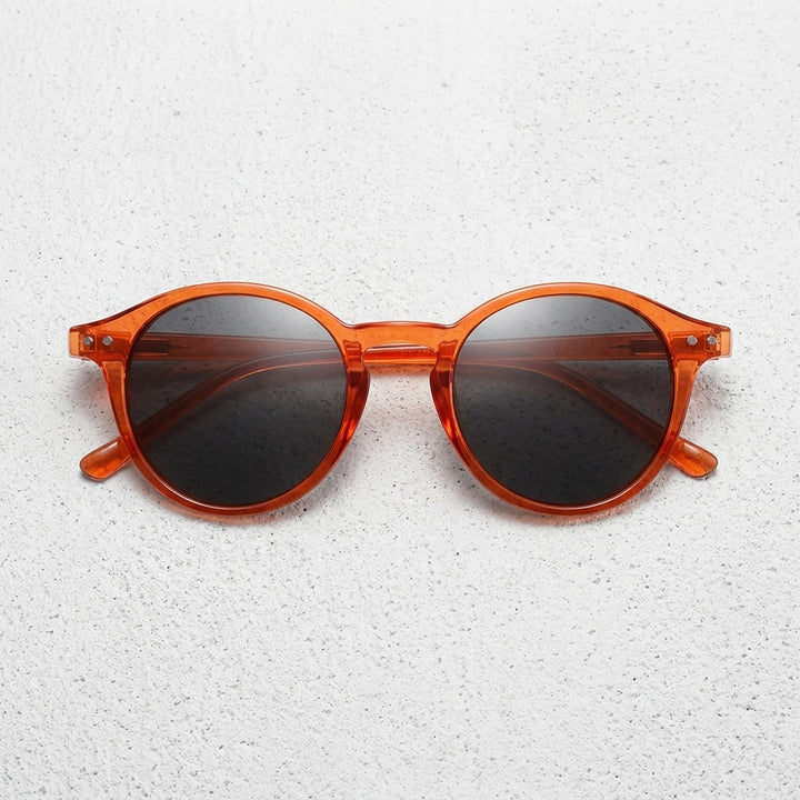 Frame: Amber / Brown Tortoiseshell Lens: Dark Brown